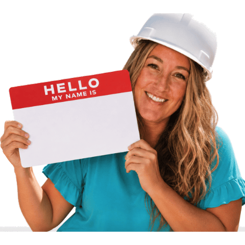 Jenny holding a blank name tag for the Off-The-Books Pen Name Generator